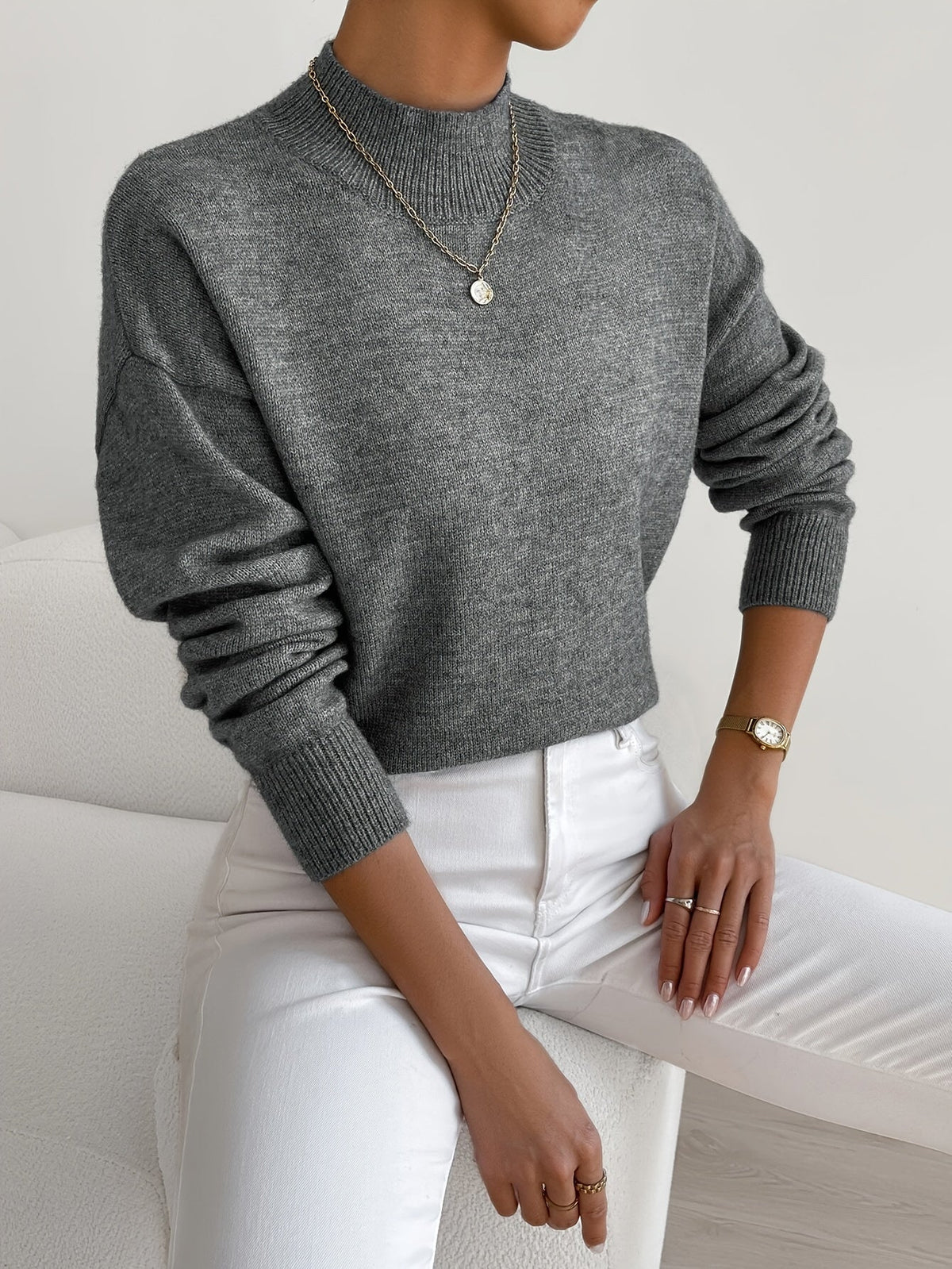 Sure! A catchy and SEO-friendly translation for "MAGLIONE" in Italian could be: **"Maglione Elegante per Ogni Occasione - Comfort e Stile"**. This title highlights elegance, versatility, comfort, and style, making it appealing for search engines and poten