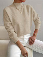 Sure! A catchy and SEO-friendly translation for "MAGLIONE" in Italian could be: **"Maglione Elegante per Ogni Occasione - Comfort e Stile"**. This title highlights elegance, versatility, comfort, and style, making it appealing for search engines and poten