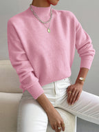 Sure! A catchy and SEO-friendly translation for "MAGLIONE" in Italian could be: **"Maglione Elegante per Ogni Occasione - Comfort e Stile"**. This title highlights elegance, versatility, comfort, and style, making it appealing for search engines and poten