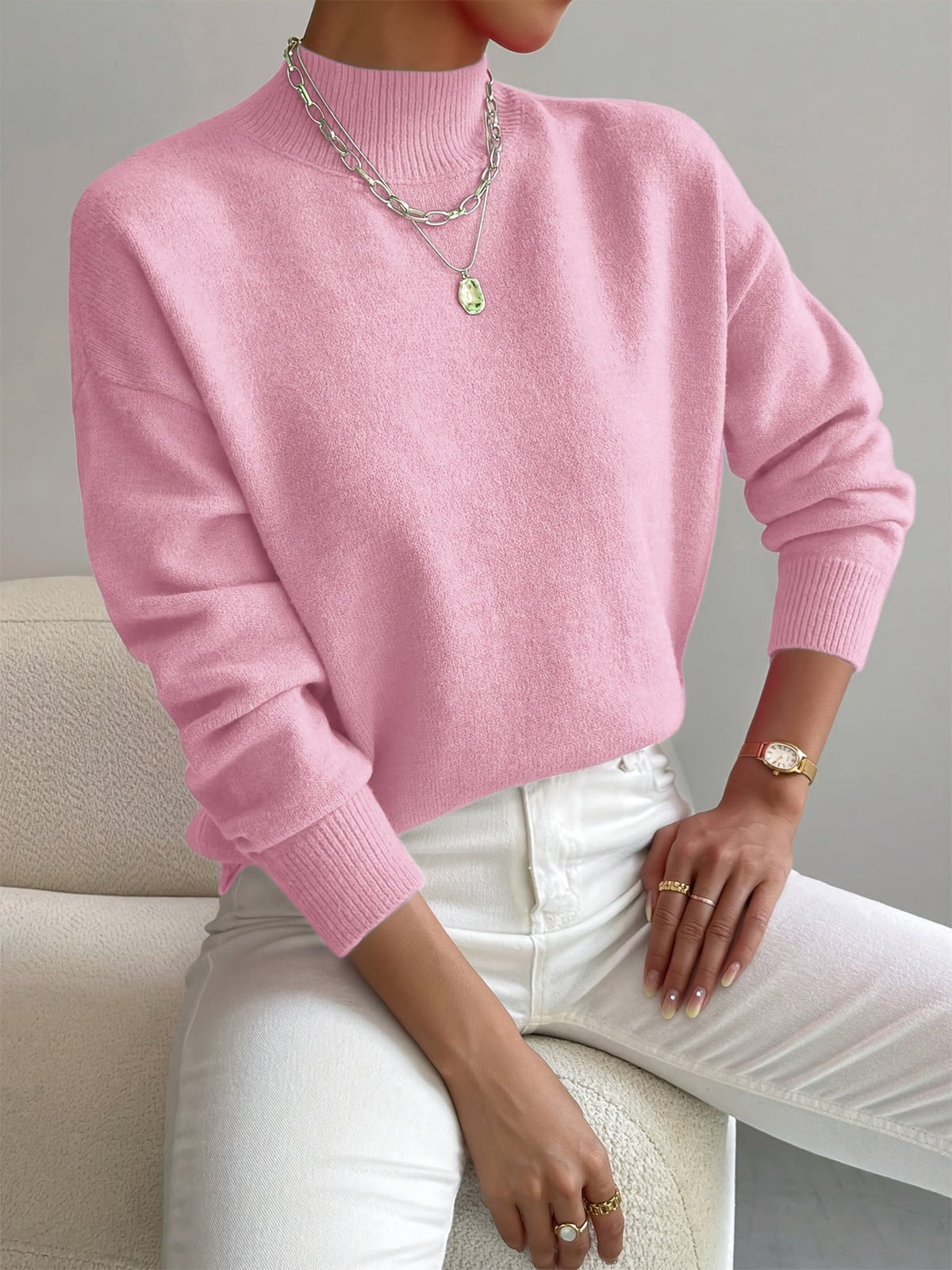 Sure! A catchy and SEO-friendly translation for "MAGLIONE" in Italian could be: **"Maglione Elegante per Ogni Occasione - Comfort e Stile"**. This title highlights elegance, versatility, comfort, and style, making it appealing for search engines and poten